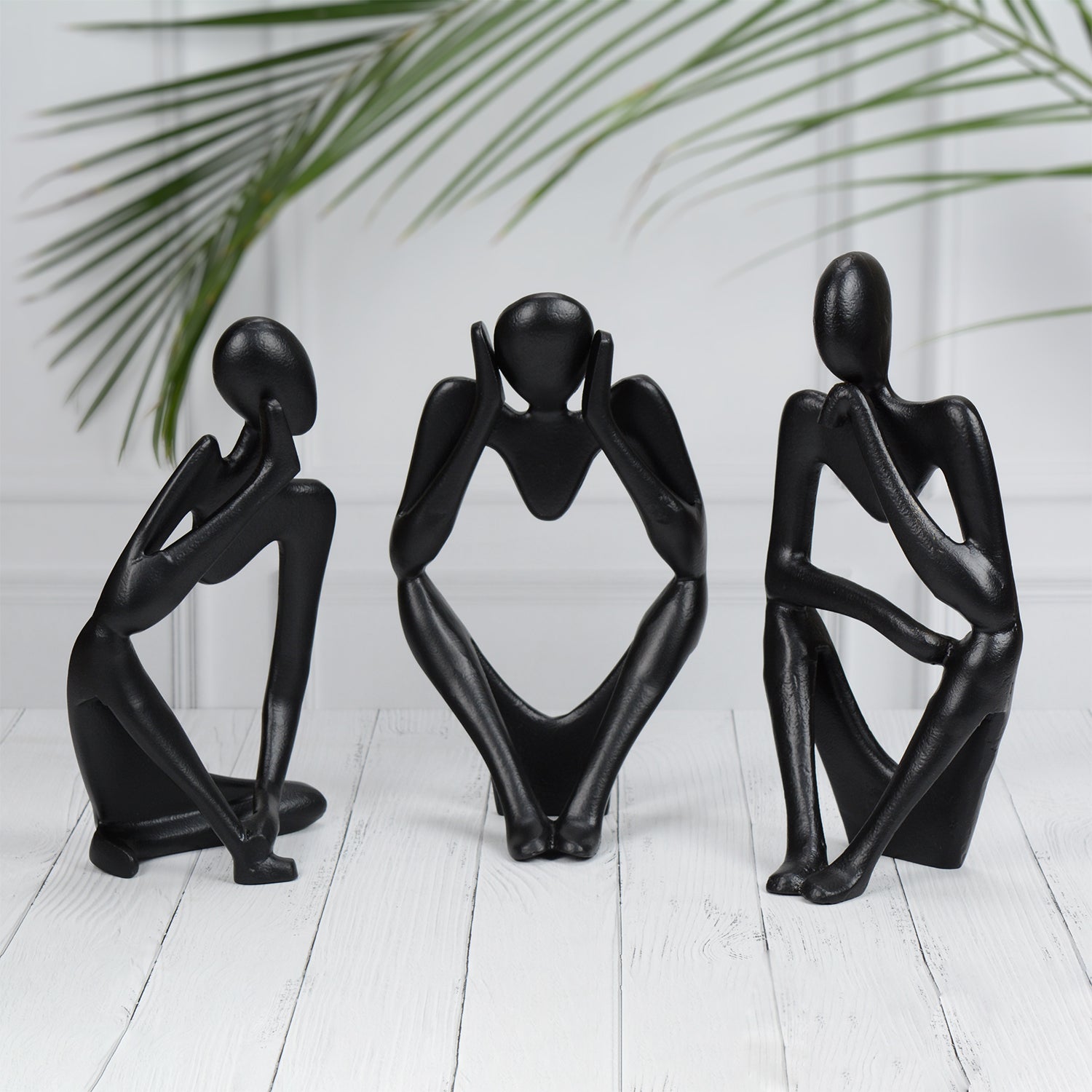 Black Hollow Man Sculpture Set